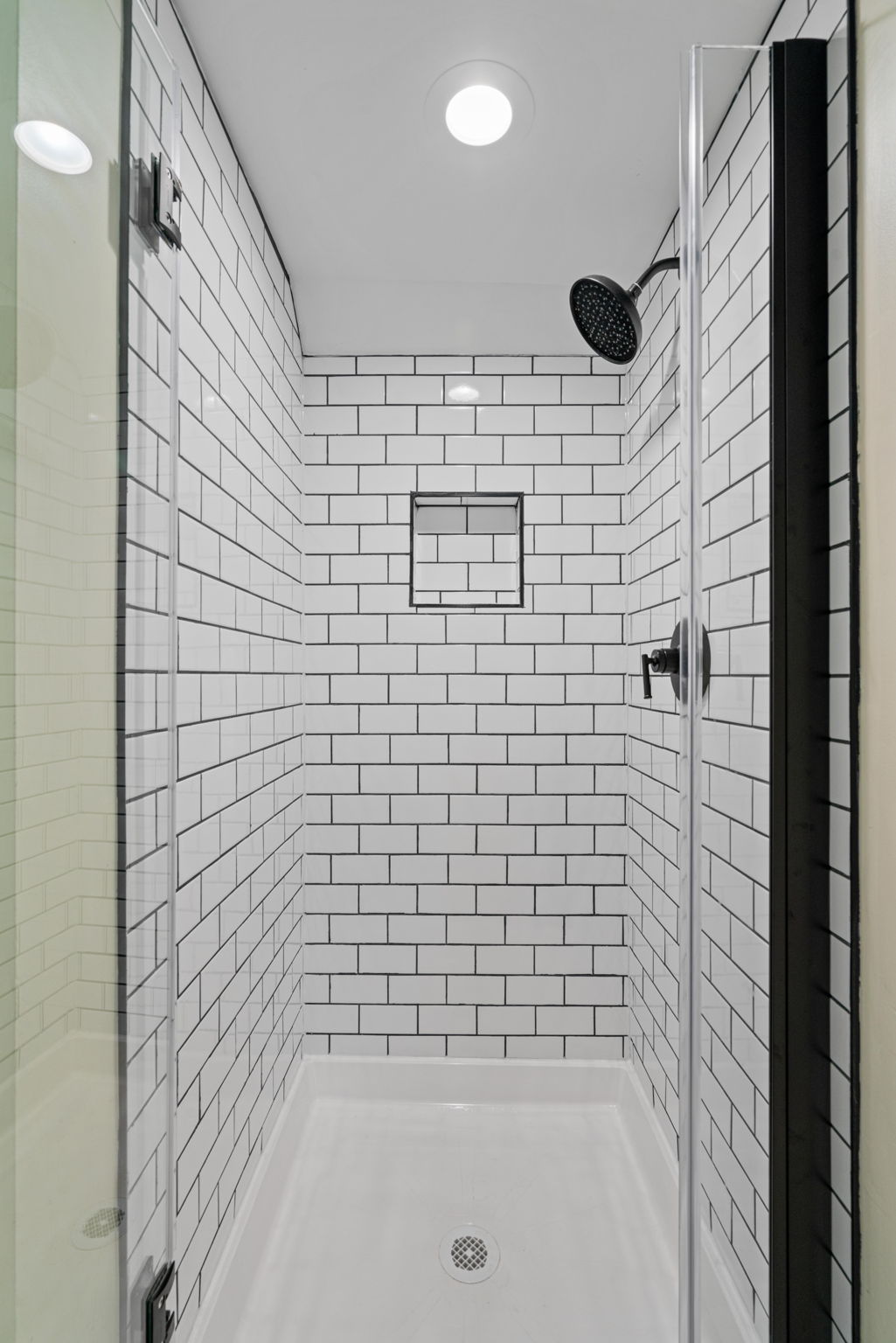 Basement Shower — Subway Tile Detail and Matte Black Fixtures — JB Design and Renovations Dumfries VA